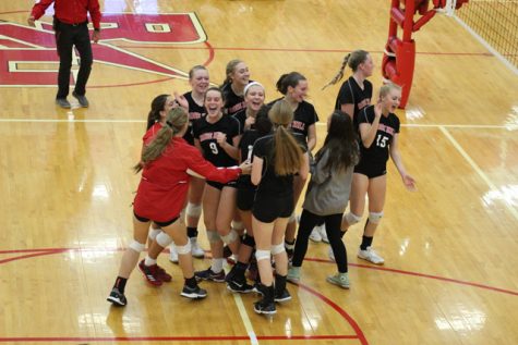 The Rocket volleyball team celebrates their sub-state victory over Nickerson on Saturday, October 21. The Rockets are the fourth seed at the state tournament in Hutchinson.